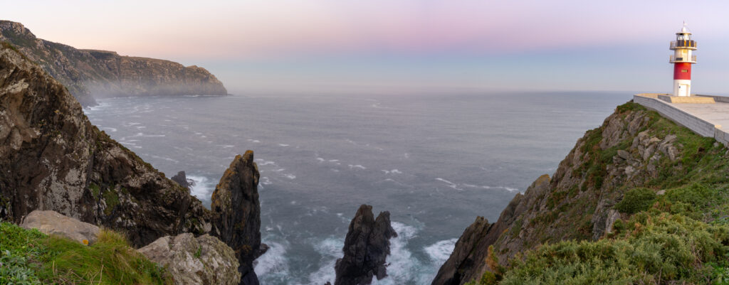 A panorama of the Cabo Ortegal lighthouse on the coast of Galicia at sunset